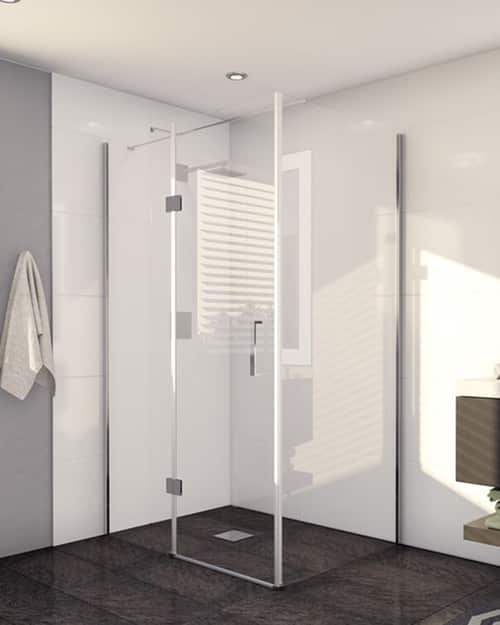 An enclosed shower with glass shower screens