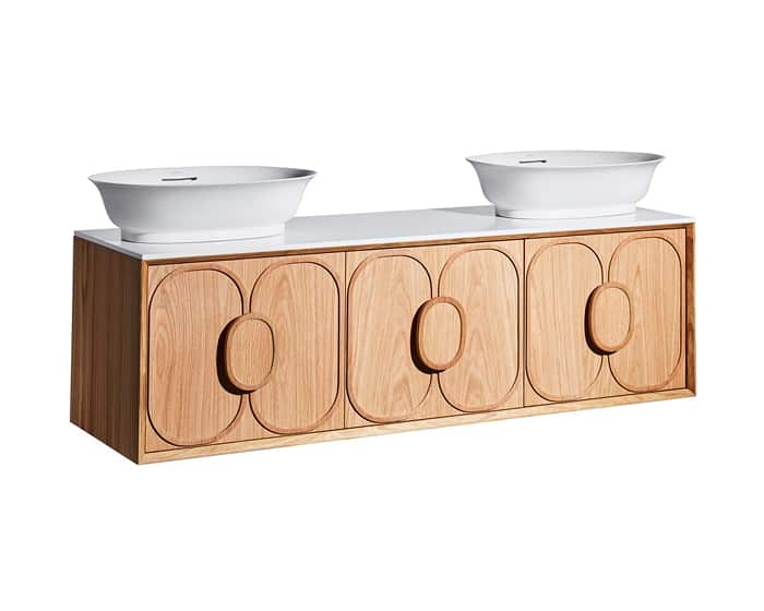 An intricate timber vanity with two above counter basins