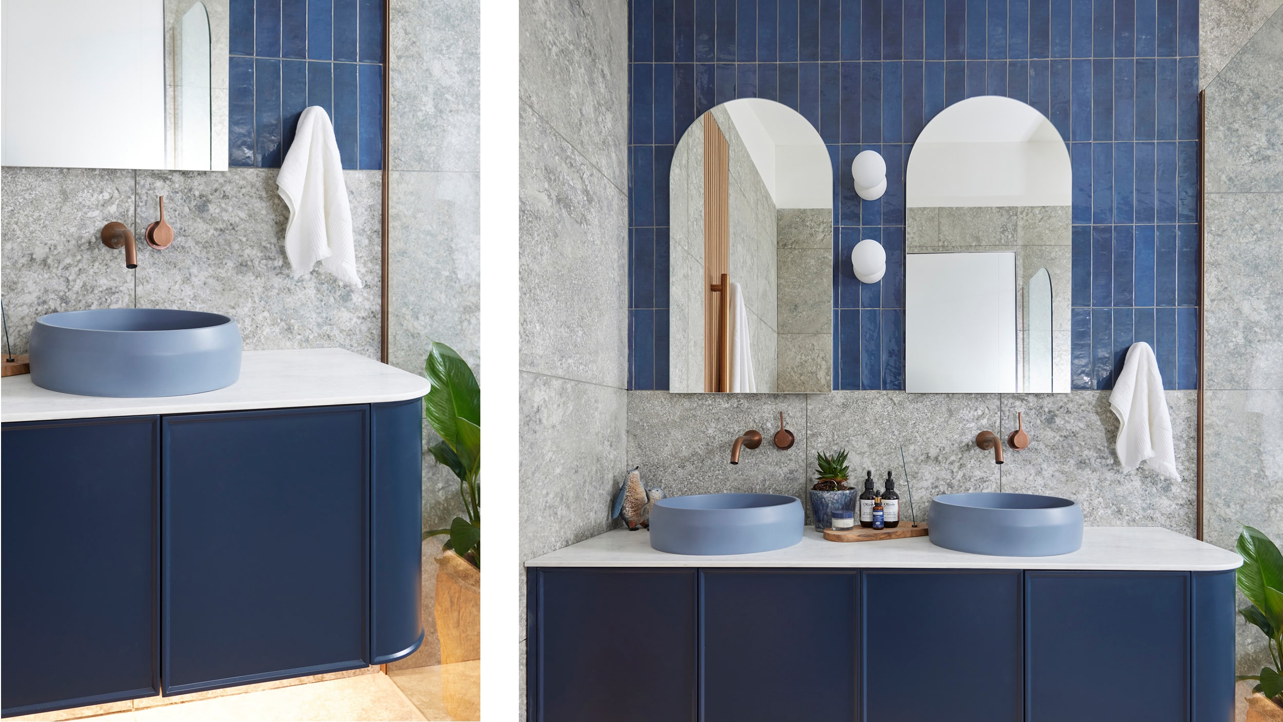 A stylish bathroom featuring a blue vanity, blue tiled wall, blue basins with grey walls and bronze tapware.