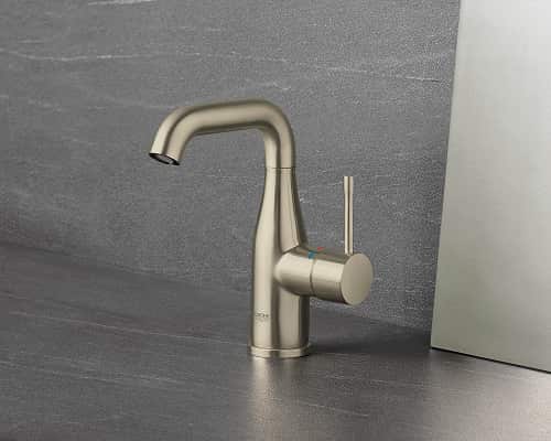 A brushed nickel basin mixer