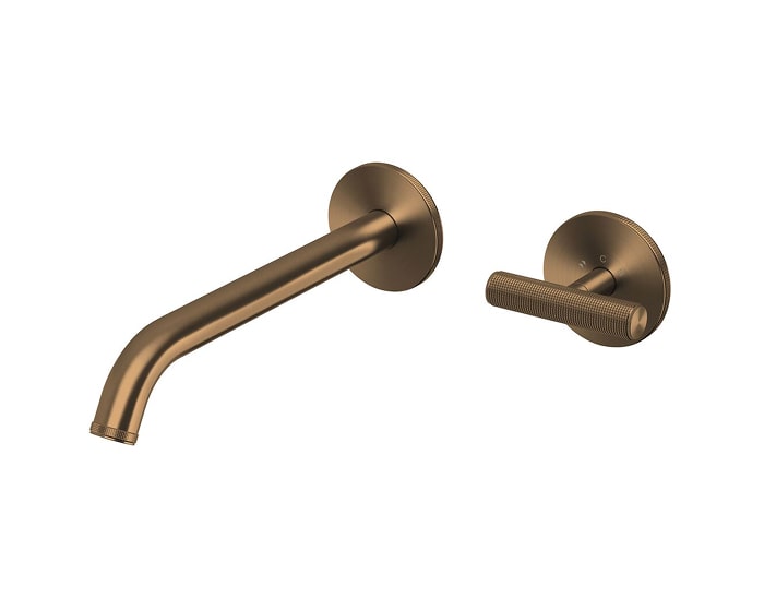 A brushed brass tap and mixer