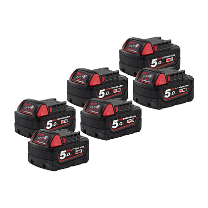 A selection of Milwaukee batteries and chargers