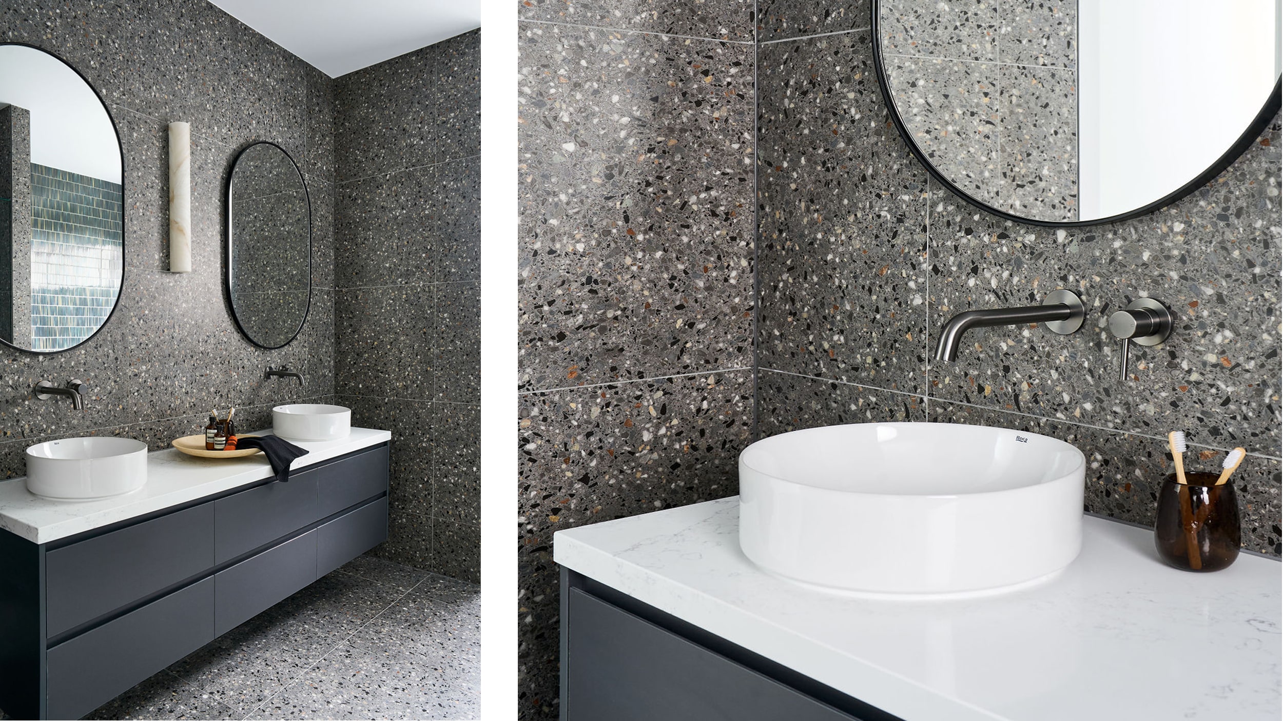 An elegant, moody bathroom with a white basin paired with a round mirror, dark metal tapware and a dark wooden vanity.