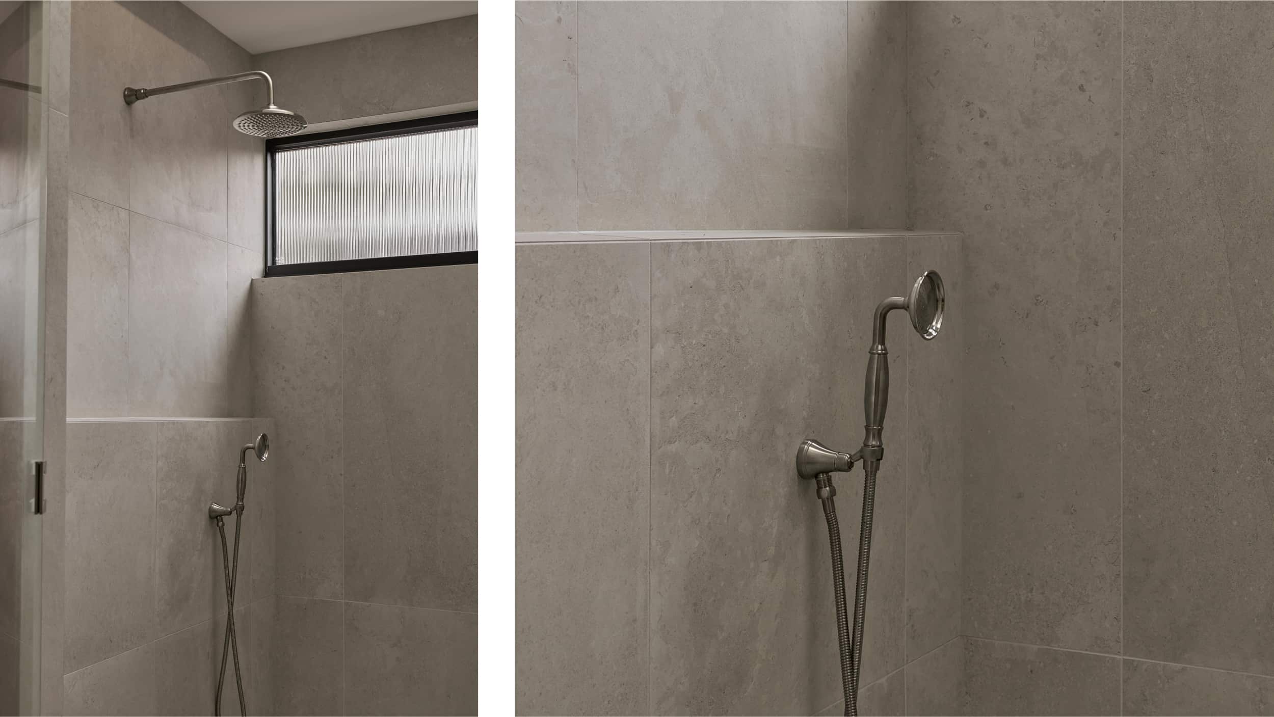 Brushed nickel showerhead and handshower in an expansive shower area