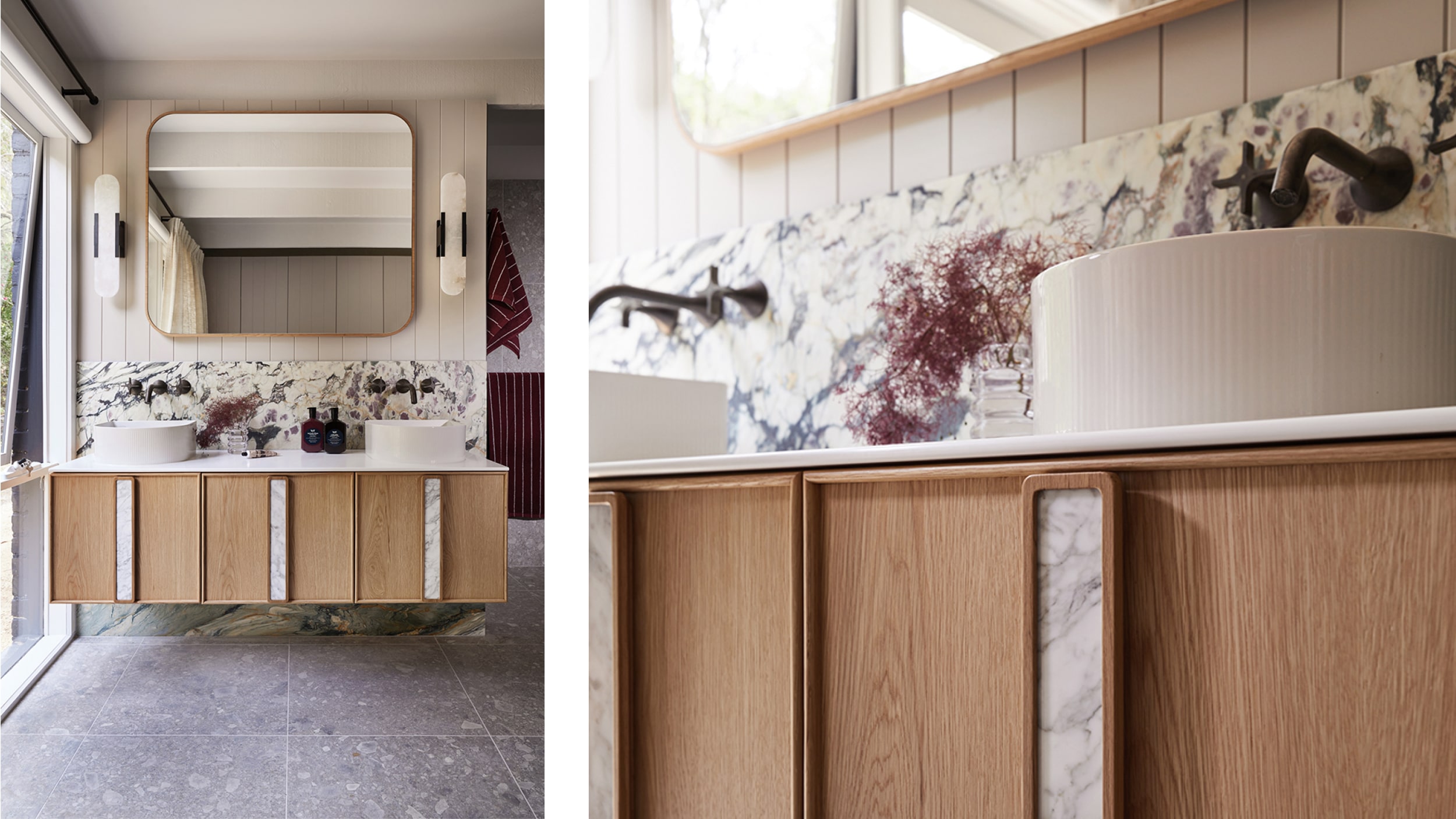 A light, bathroom with timber vanity, two basins, sculptural mirror and marble backsplash.