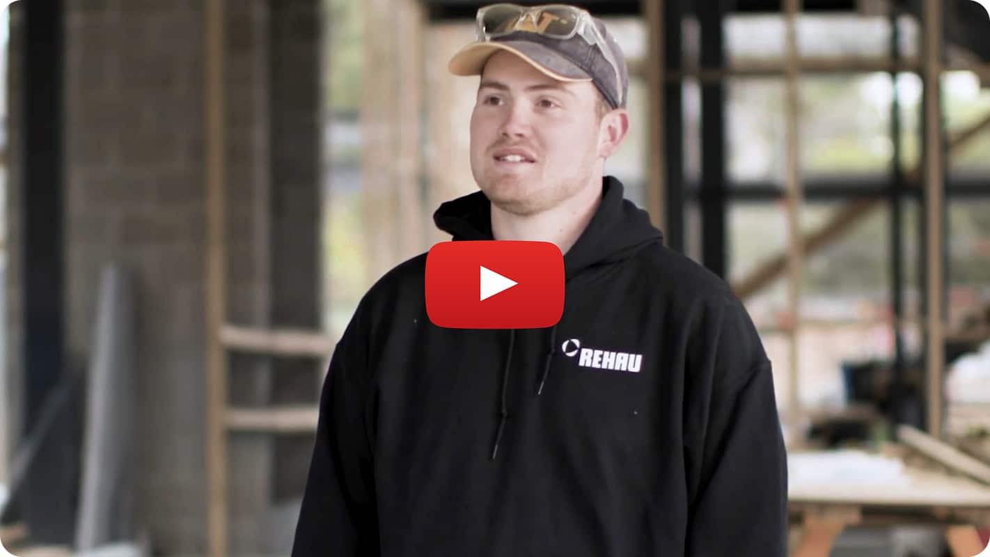 A still of a YouTube video, featuring a plumber being interviewed.