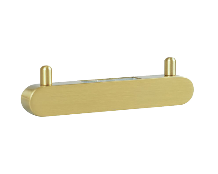 A double robe hook in brushed brass